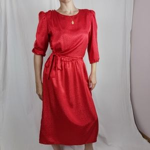 *Sold* Medium vintage red satin animal print dress